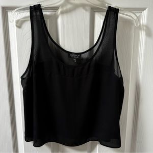 Topshop sheer and opaque black crop tank top.